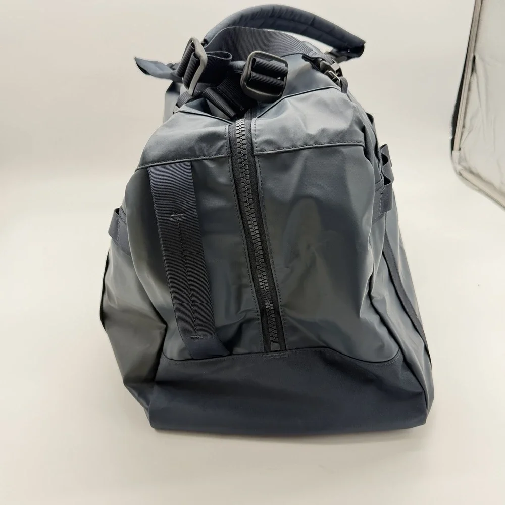 Away F.A.R. Duffle 55L Navy Blue Active Travel Duffel Backpack Bag
